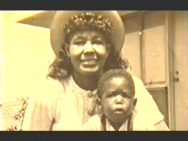 barry white with mother young boy